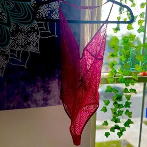 Never worn Victoria Secret size medium animal print bodysuit